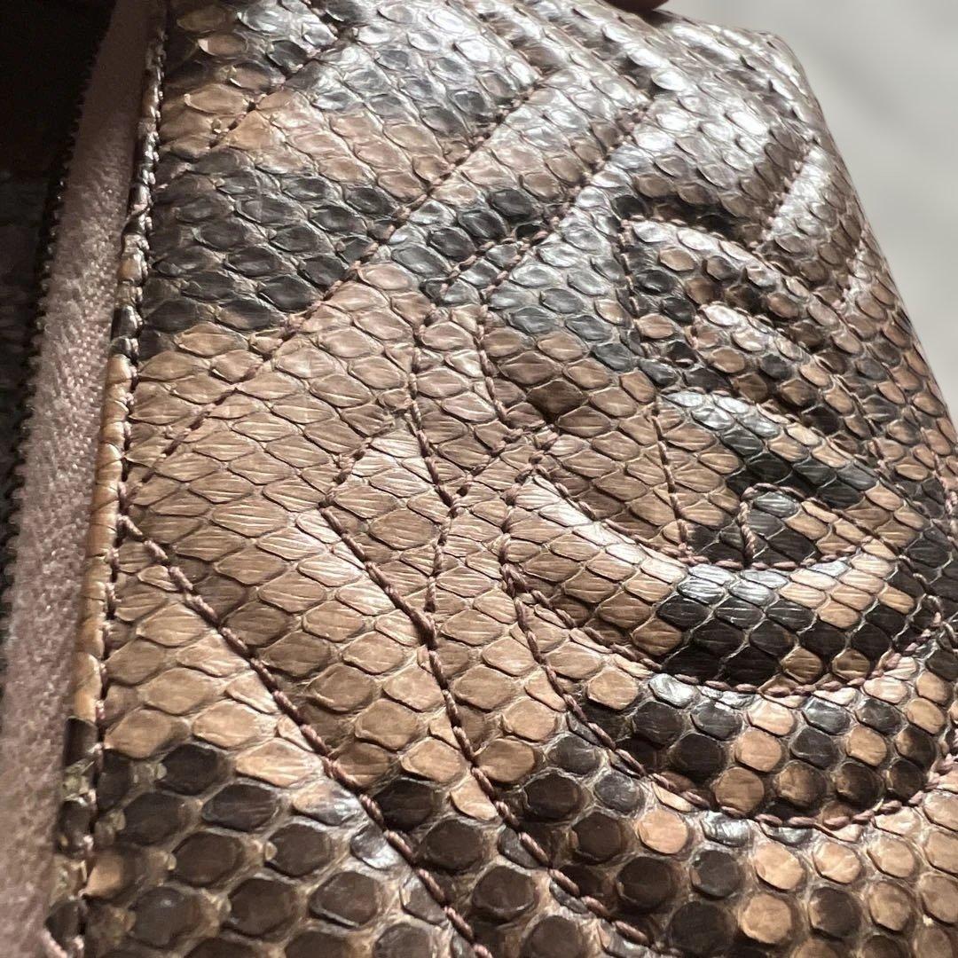 GUCCI ヘビ革 長財布 ピンク系