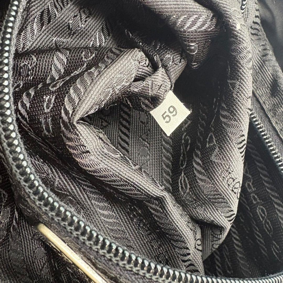 チマ　PRADA 三角プレート ナイロン ブラック バックパック A4