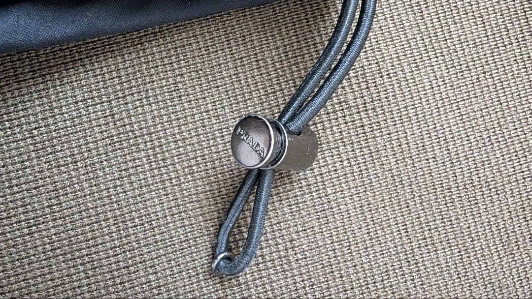 プラダスポーツ　オリーブグリーン タートルネックニット　ダメージ有り　48