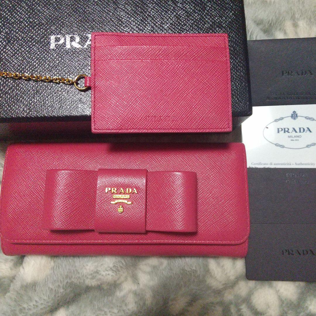 PRADAサフィアーノ レザーリボン付き 長財布 レッド系