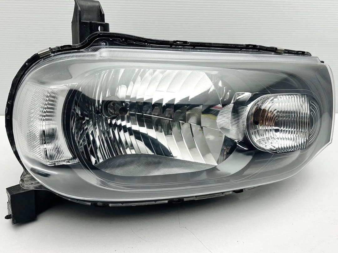 キューブ ヘッドライト ヘッドランプ ハロゲン STANLEY P8190