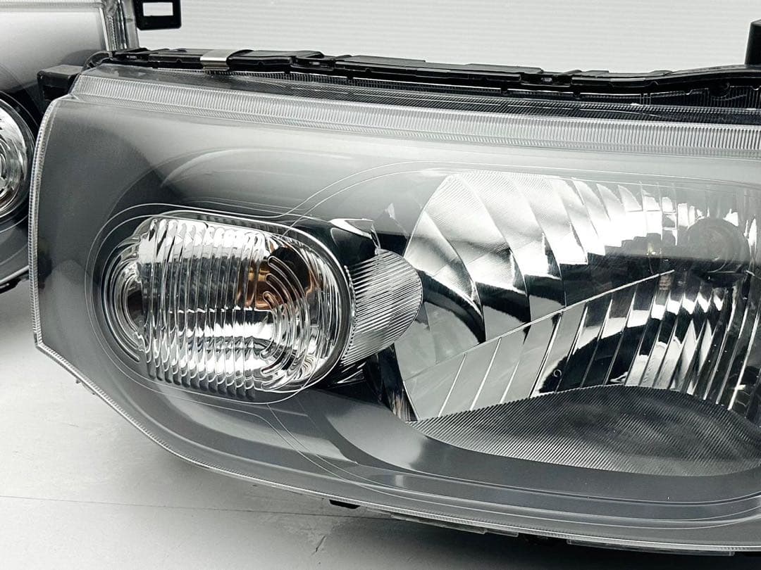 キューブ ヘッドライト ヘッドランプ ハロゲン STANLEY P8190