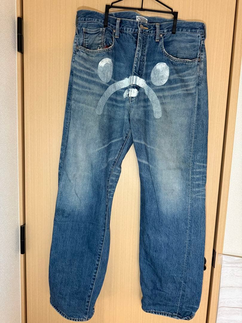 【服と書いて人】A BATHING APE 顔プリントデニムパンツ