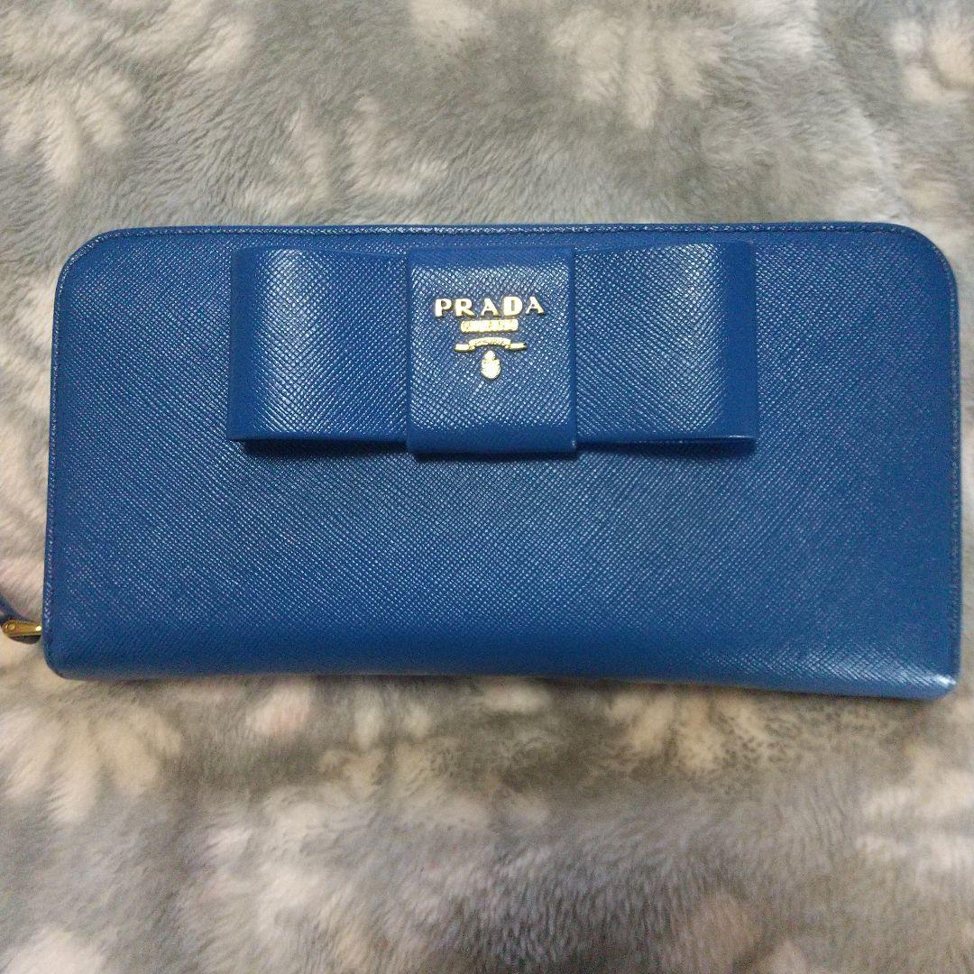 PRADAサフィアーノラウンドファスナー リボン付き長財布