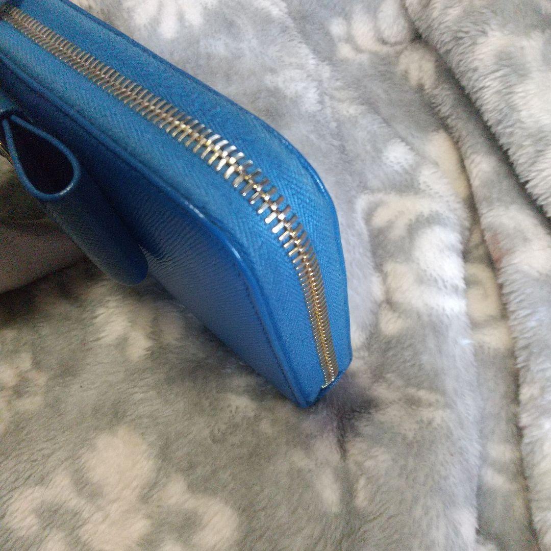 PRADAサフィアーノラウンドファスナー リボン付き長財布