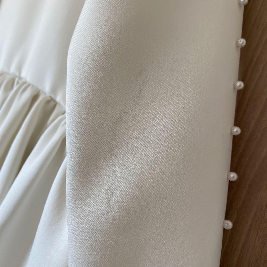 ツルバイマリコオイカワ　パール付きペプラムトップス