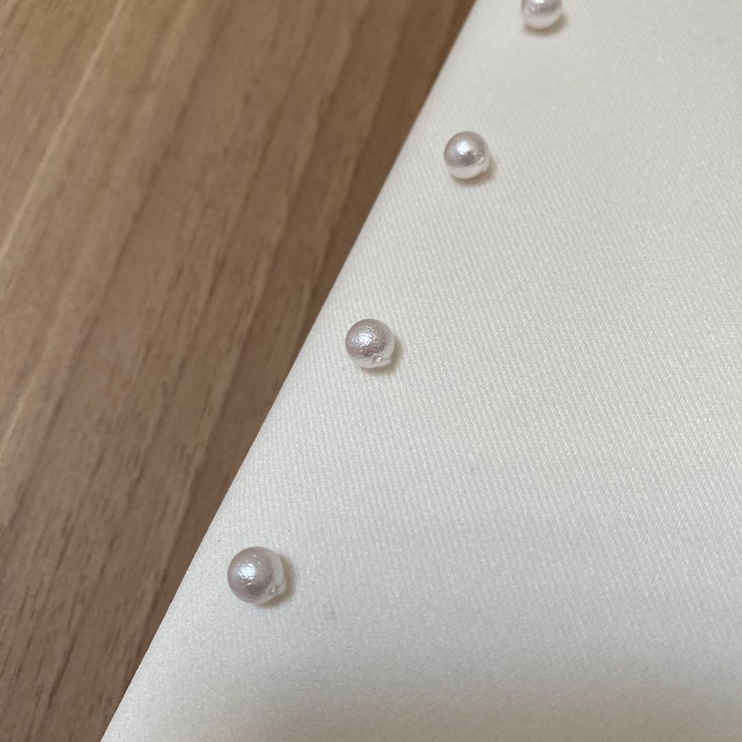 ツルバイマリコオイカワ　パール付きペプラムトップス