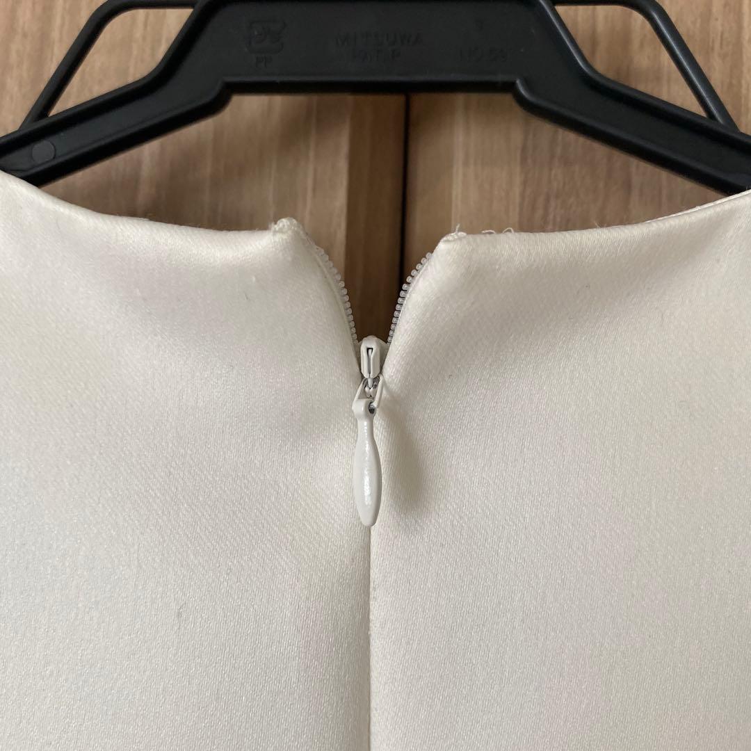 ツルバイマリコオイカワ　パール付きペプラムトップス