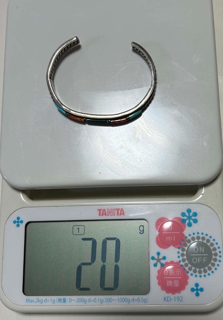 ナバホ族　ターコイズ・オレンジ他 シルバーバングル(Jダグラス )お値下げ