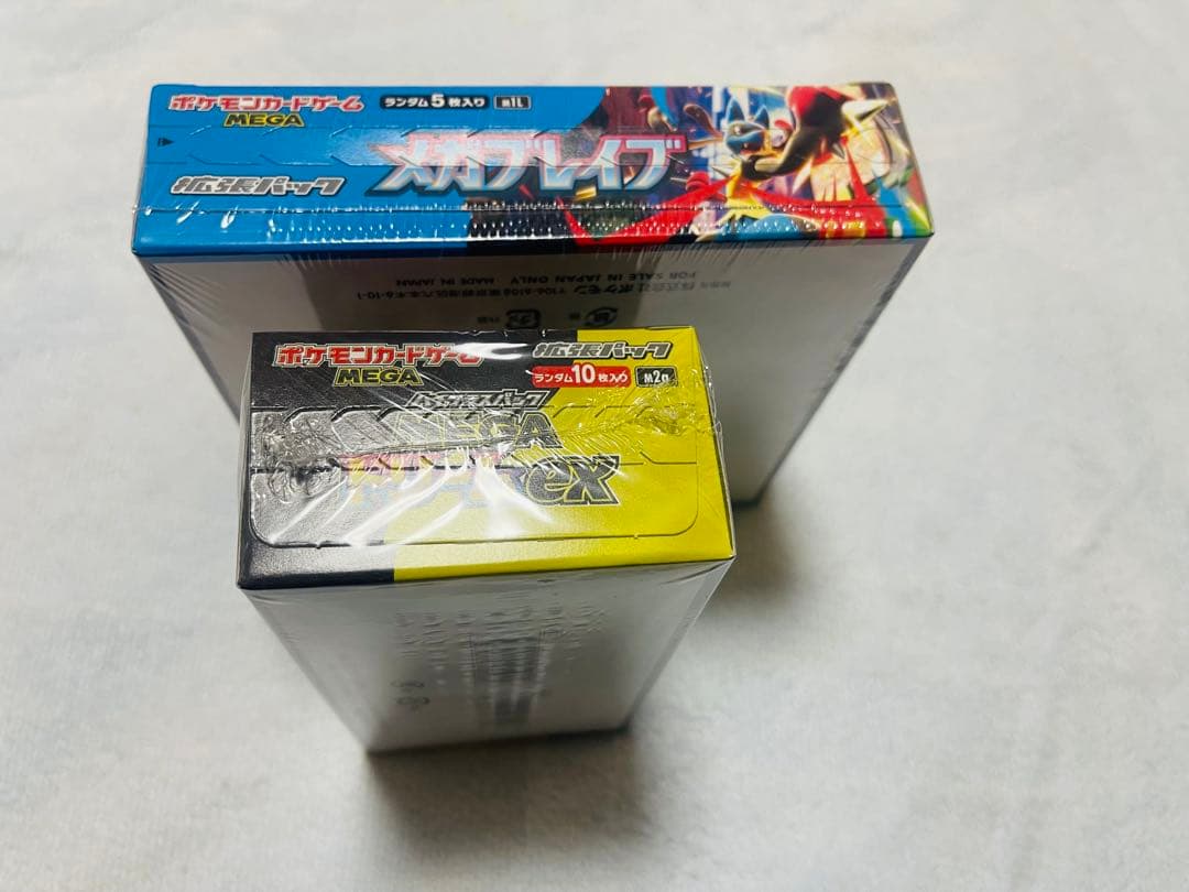 シュリンク付きのポケモンカードゲーム メガドリームEXとメガブレブ