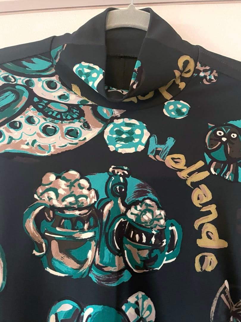 トクコプルミエヴォル/カーキ系グラフィックプリント 長袖チュニック