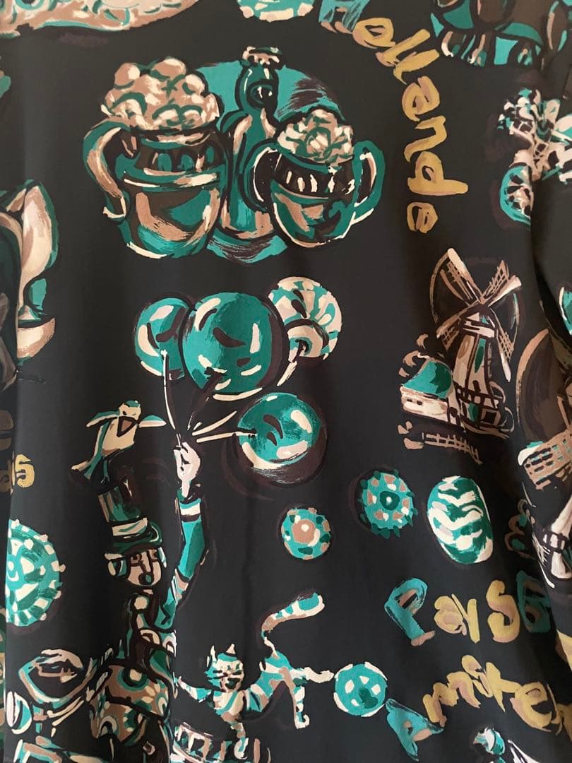 トクコプルミエヴォル/カーキ系グラフィックプリント 長袖チュニック