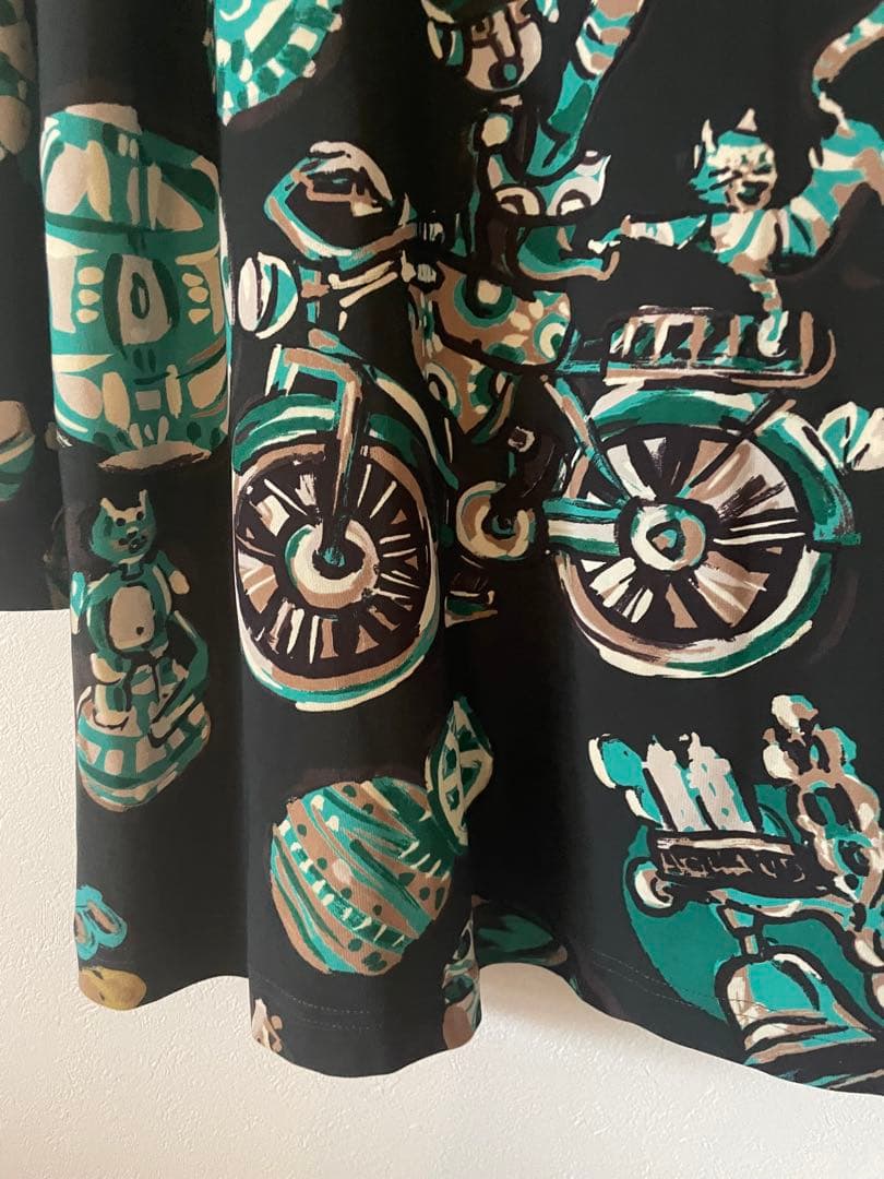 トクコプルミエヴォル/カーキ系グラフィックプリント 長袖チュニック