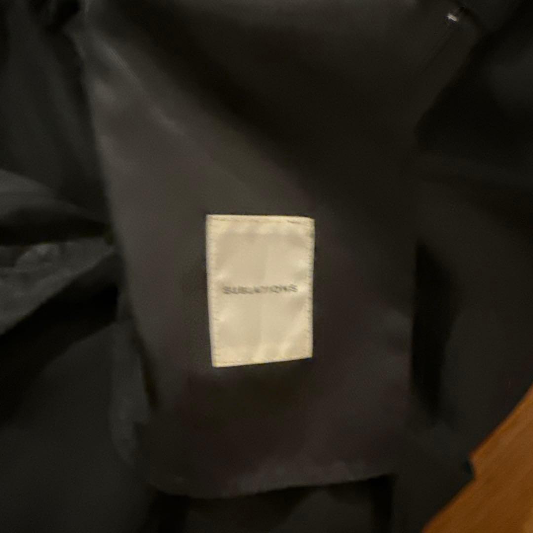 subulations ヘビーウールワイドフレアスラックス黒