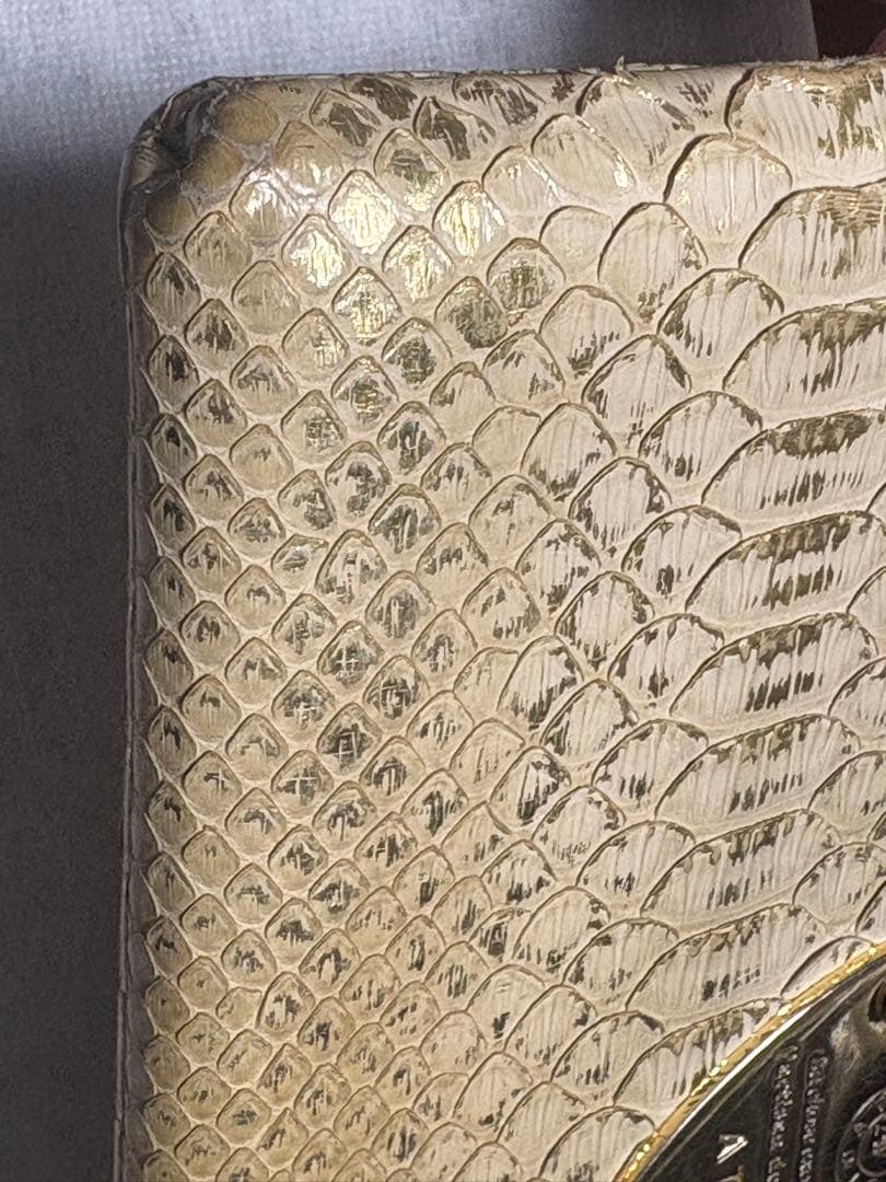 ATAOゴールド ヘビ柄 長財布