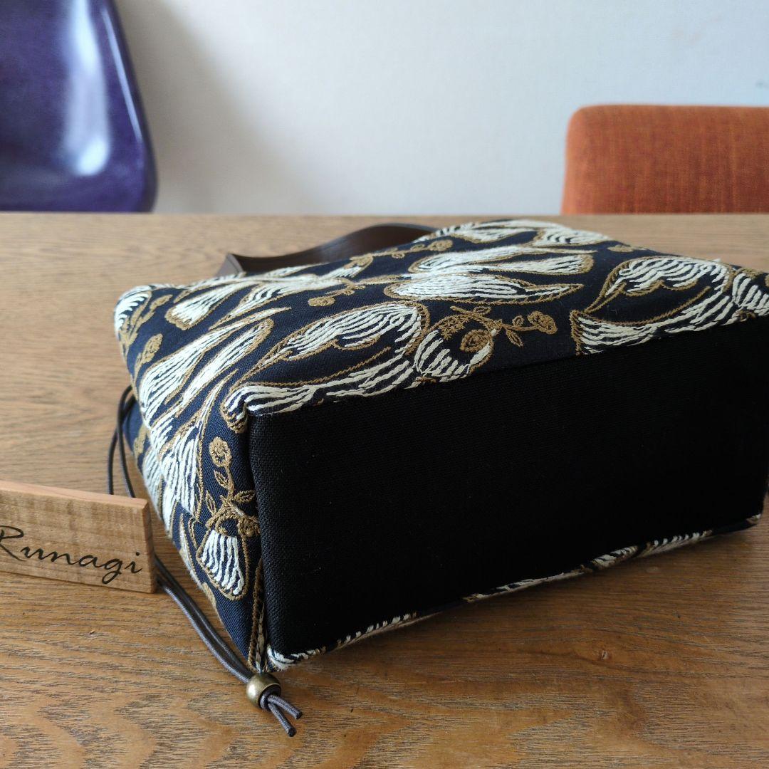 あおりポケットの巾着バッグ＊ミナペルホネン following day