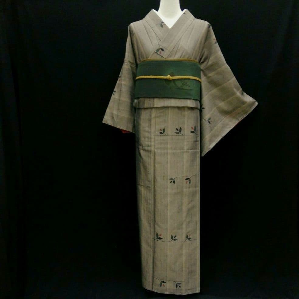 紬(袷)　(織出し枝葉紋様　縦節紬　未使用)