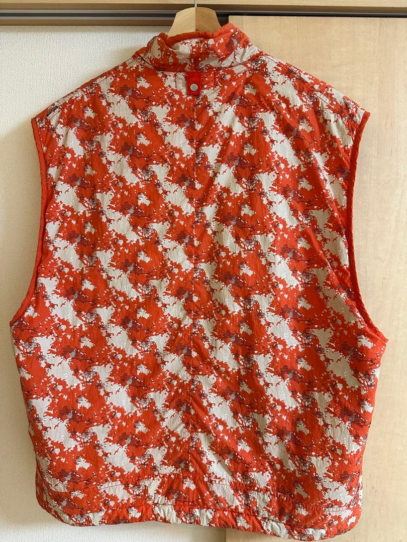 ストーンアイランド シャドウプロジェクト ベスト オレンジ 総柄