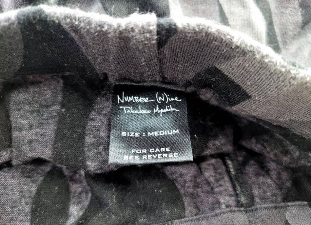 ナンバーナイン トライバルカモ ハートに涙