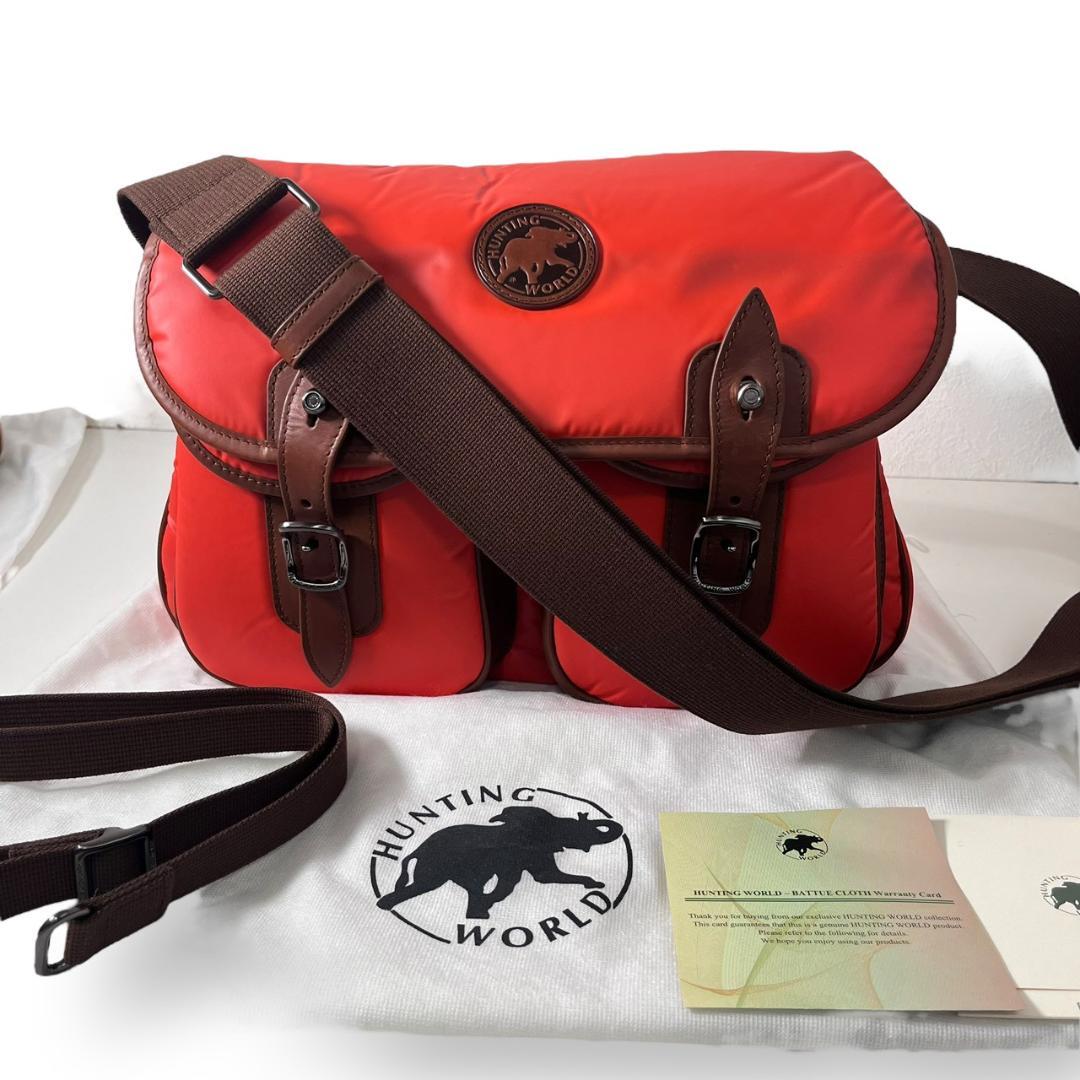 ハンティングワールド バチューサーパス キャリーオール オレンジ バッグ