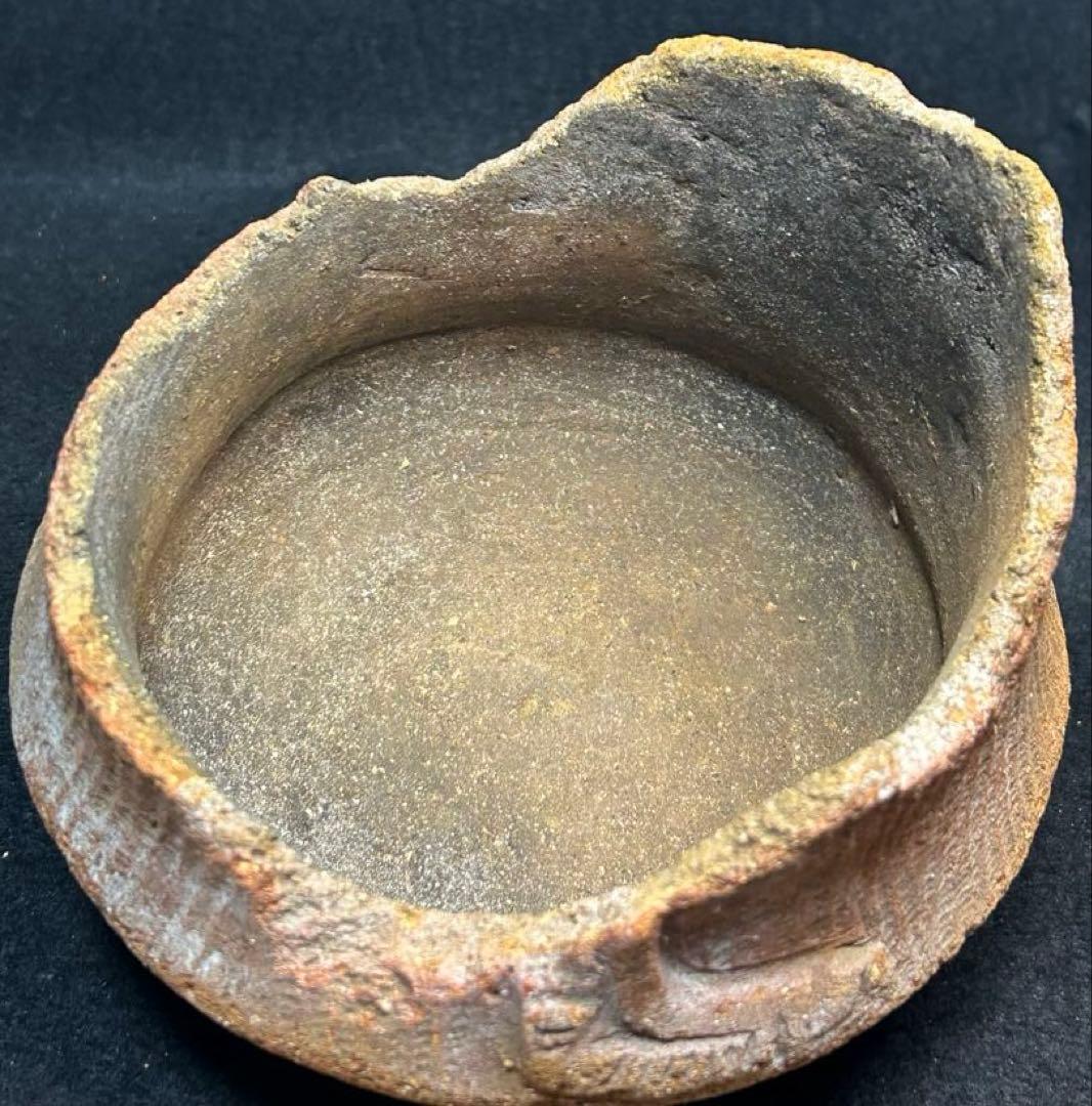 縄文土器　獣面把手と縄文土器底部