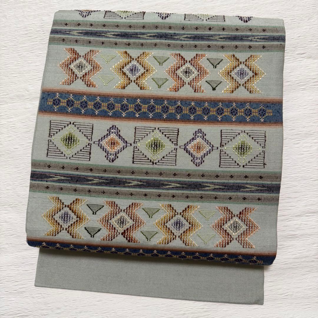 m-52 沖縄県指定無形文化財 読谷山花織 本場琉球 名古屋帯 正絹 極美品