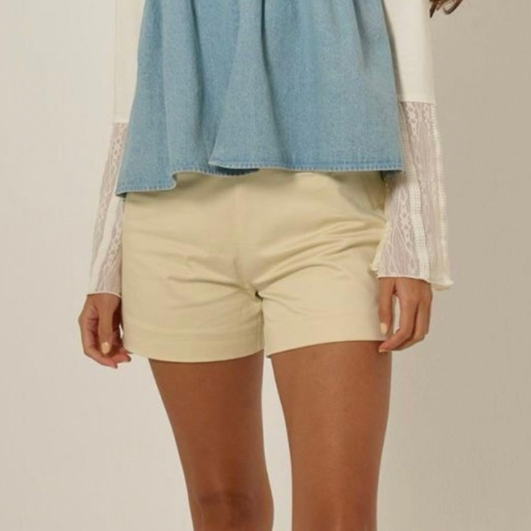 TINA：JOJUN フリルラップレイヤード ショートパンツ