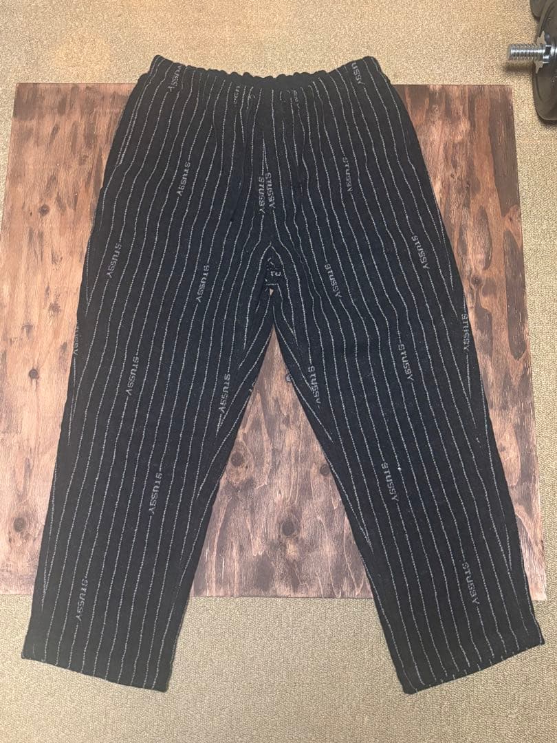 ステューシー × ナイキ ストライプ ウールパンツ ブラック