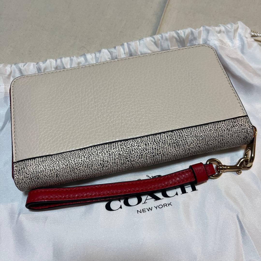 COACHストラップ付長財布 ディズニーキースヘリングコラボ