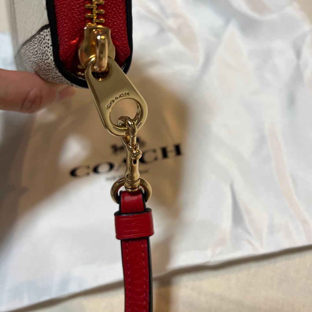 COACHストラップ付長財布 ディズニーキースヘリングコラボ