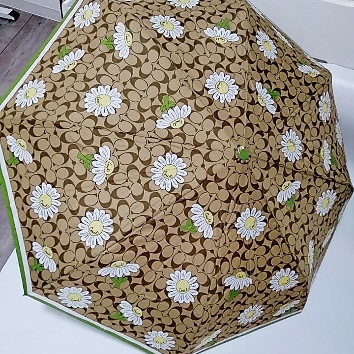 未使用品　超希少　コーチ　雨傘　折りたたみ　シグネチャー　ブラウン　花柄　傘袋
