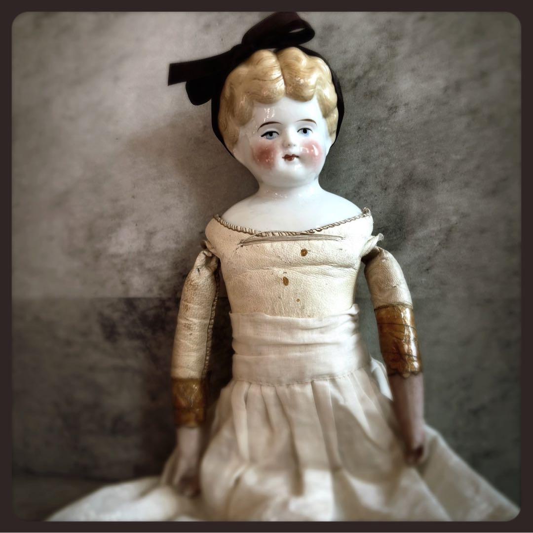 アンティーク ブロンド　チャイナヘッドドール　レザーボディ