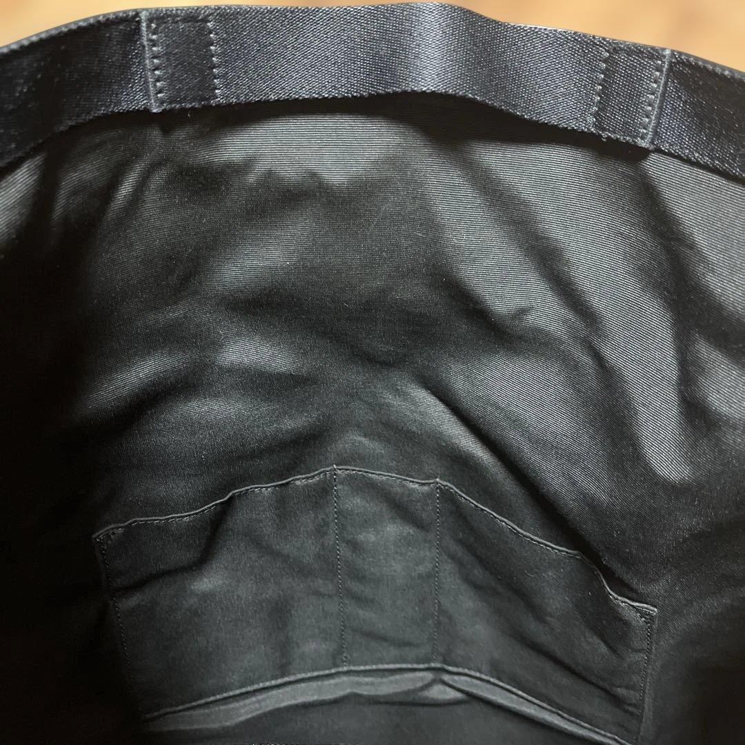 【としゆき】COACH ブラック ロールトップリュック