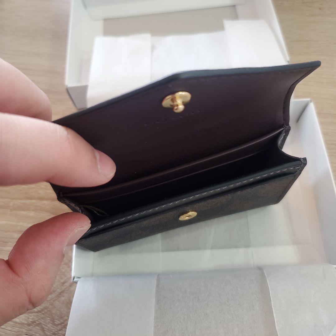 コーチ フラップ カード ケース 名刺入れ 黒 ブラウン シグネチャー 新品