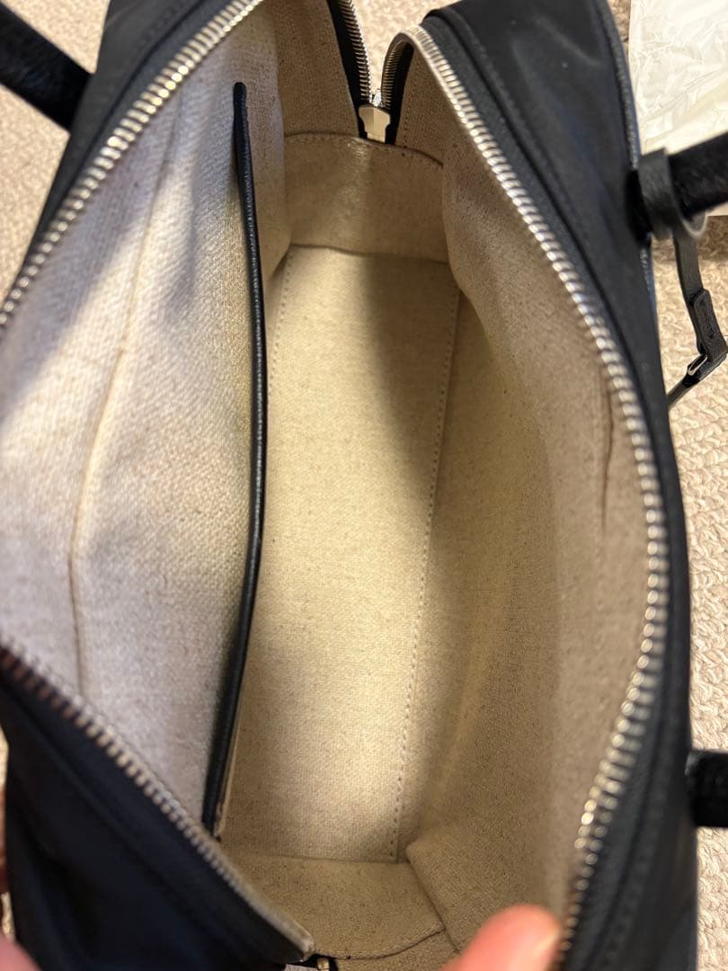 トゥティエ　ロケ ナイロン スモールバッグ