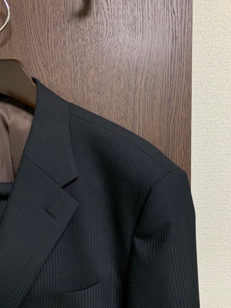 希少K5新品未使用！無地調ブラックシングルスーツ！経済的ウォッシャブル！年間定番