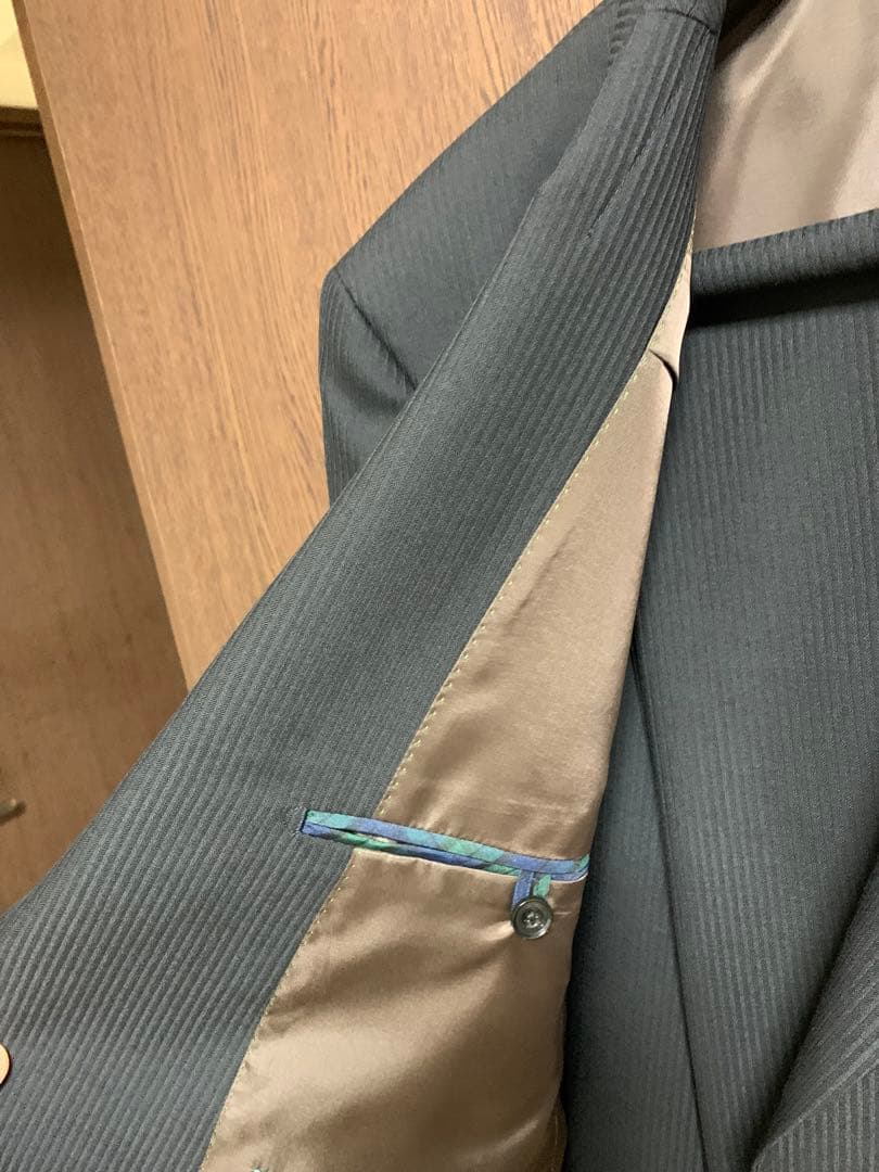 希少K5新品未使用！無地調ブラックシングルスーツ！経済的ウォッシャブル！年間定番