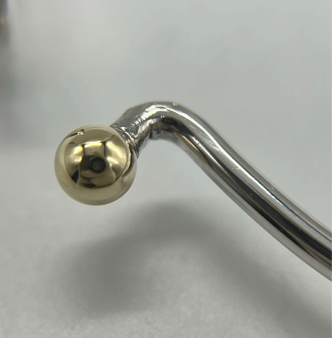 ティファニー TIFFANY ラブノット バングル SV YG コンビ