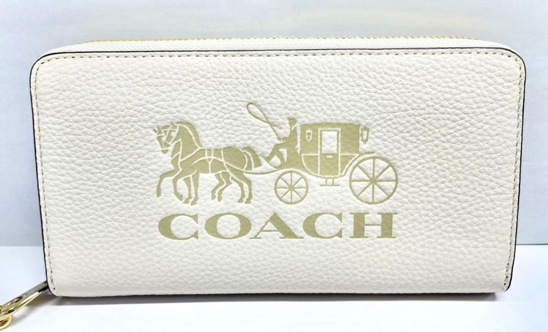 コーチ 長財布 レディース レザー ストラップ付き 馬車モチーフ オフホワイト系