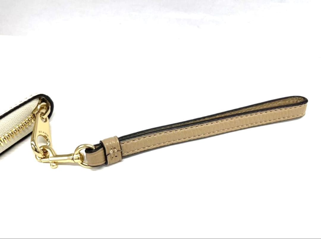 コーチ 長財布 レディース レザー ストラップ付き 馬車モチーフ オフホワイト系