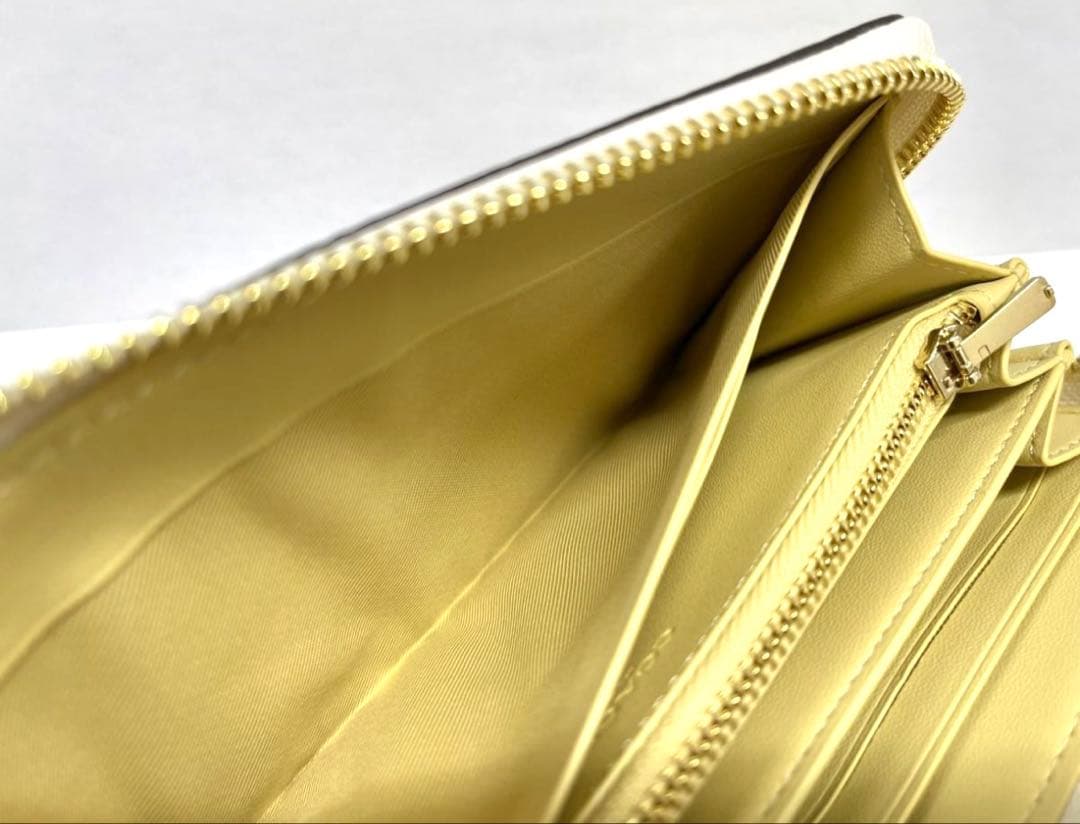 コーチ 長財布 レディース レザー ストラップ付き 馬車モチーフ オフホワイト系