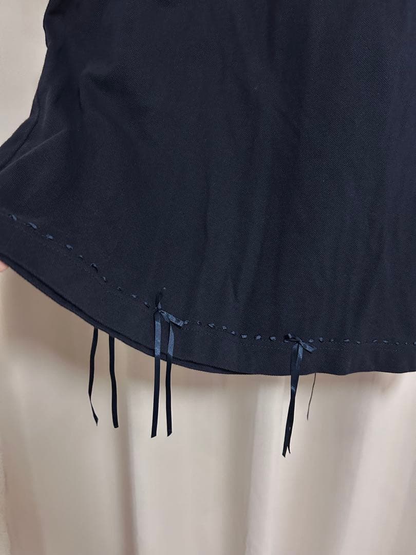 ケイスケカンダ keisukeKanda リボンのポロシャツ