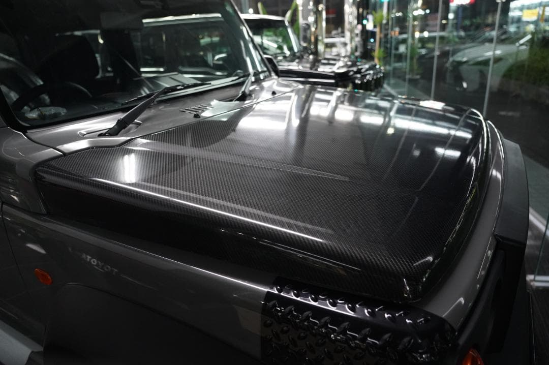 たにけんジムニーブラックカーボンボンネット　JB64　クリアー塗装品