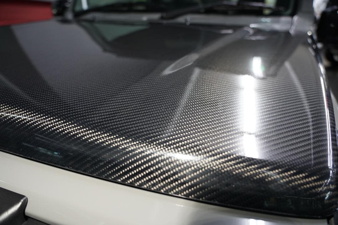 たにけんジムニーブラックカーボンボンネット　JB64　クリアー塗装品