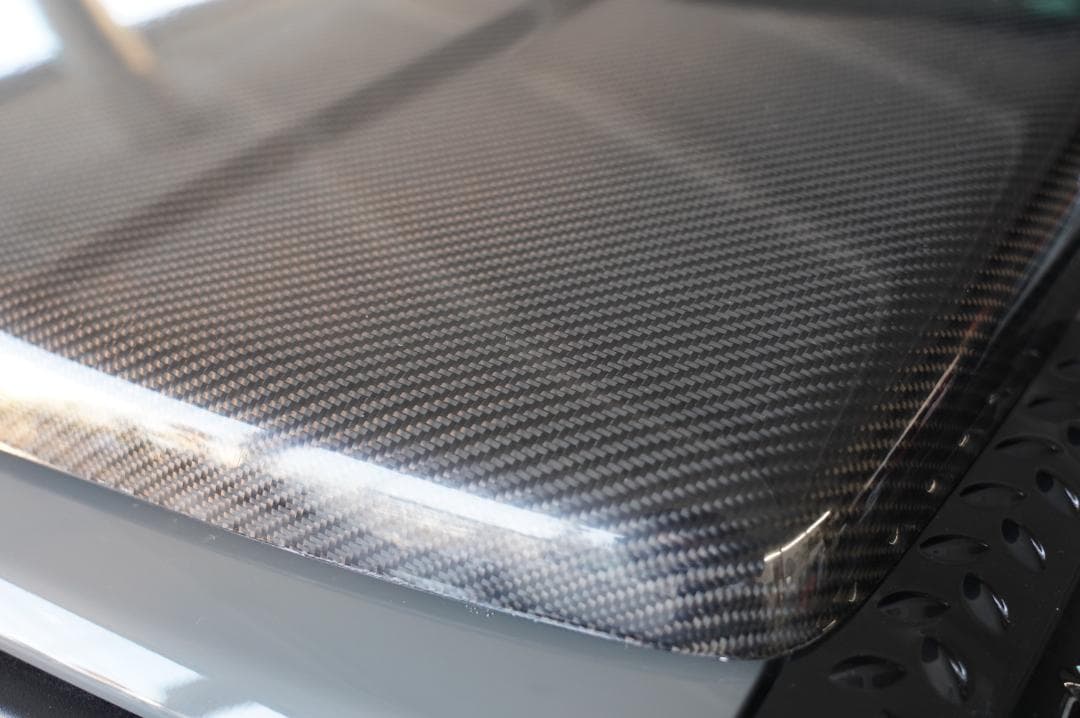 たにけんジムニーブラックカーボンボンネット　JB64　クリアー塗装品