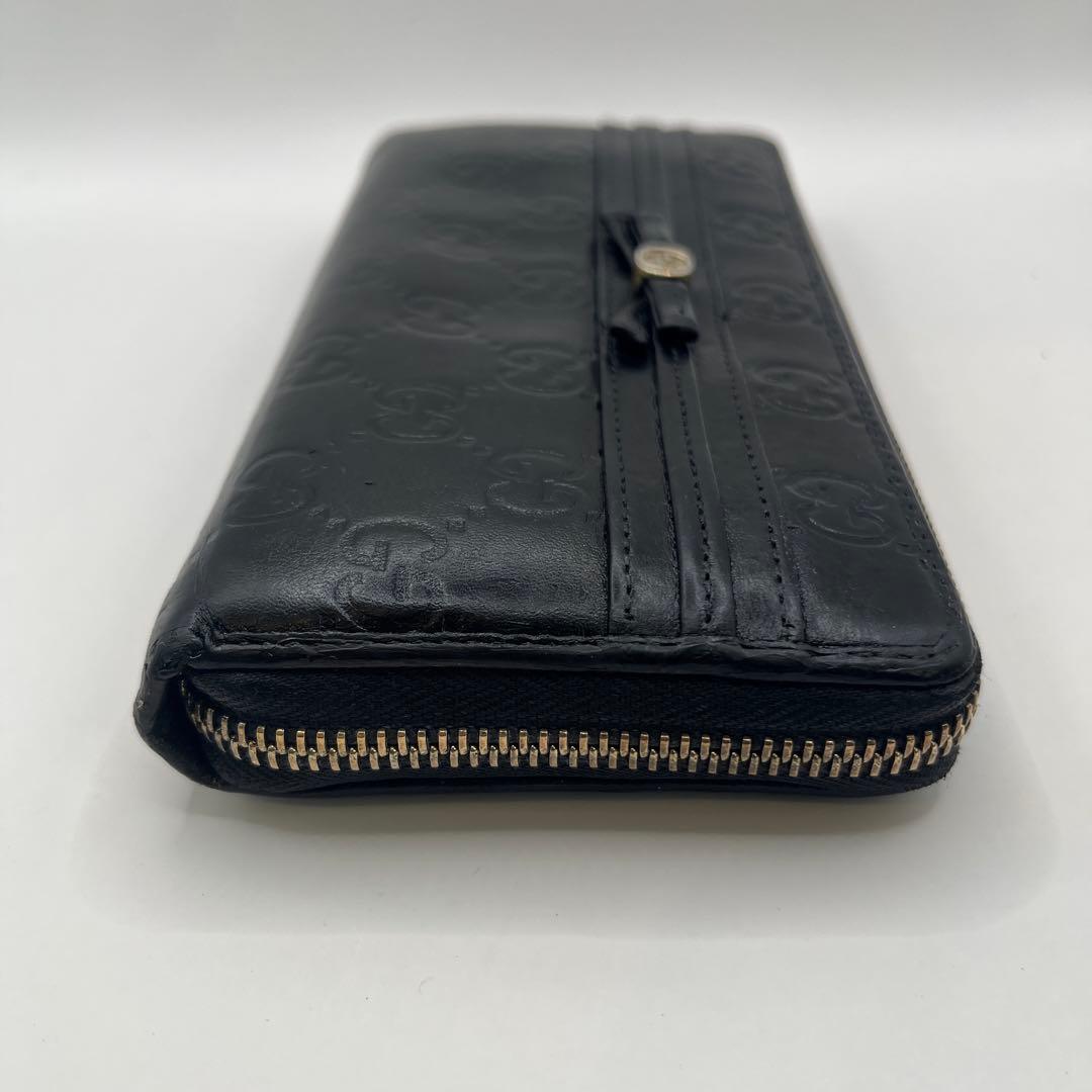 鑑定済　GUCCI グッチ ラウンドファスナー財布 GG リボン シマレザー