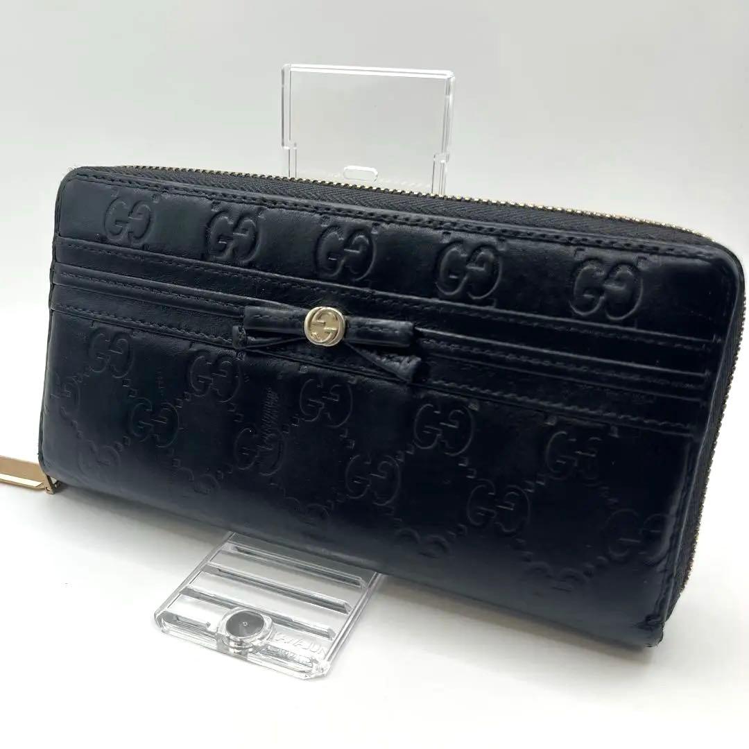 鑑定済　GUCCI グッチ ラウンドファスナー財布 GG リボン シマレザー
