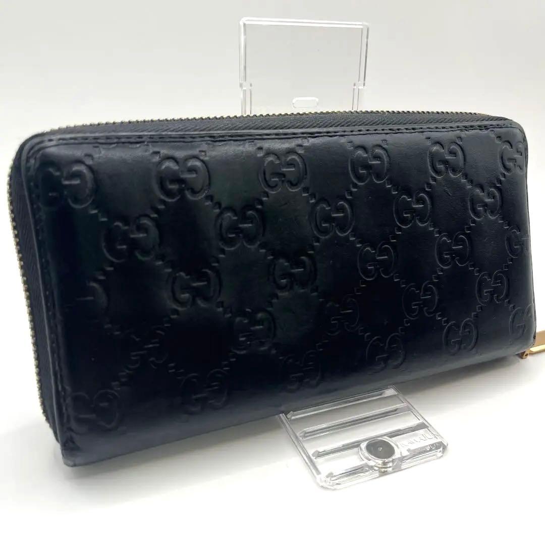鑑定済　GUCCI グッチ ラウンドファスナー財布 GG リボン シマレザー