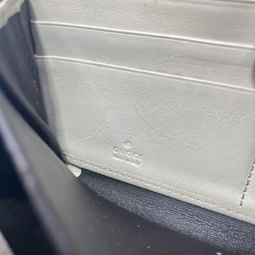 鑑定済　GUCCI グッチ ラウンドファスナー財布 GG リボン シマレザー