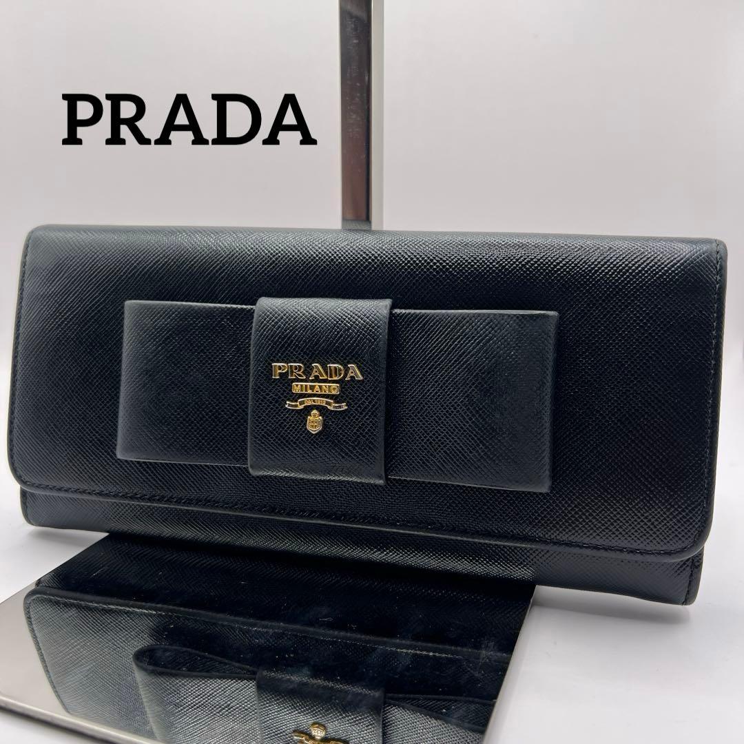 パン子プラダ　リボン　ブラック　長財布　ゴールドロゴ　スナップボタン